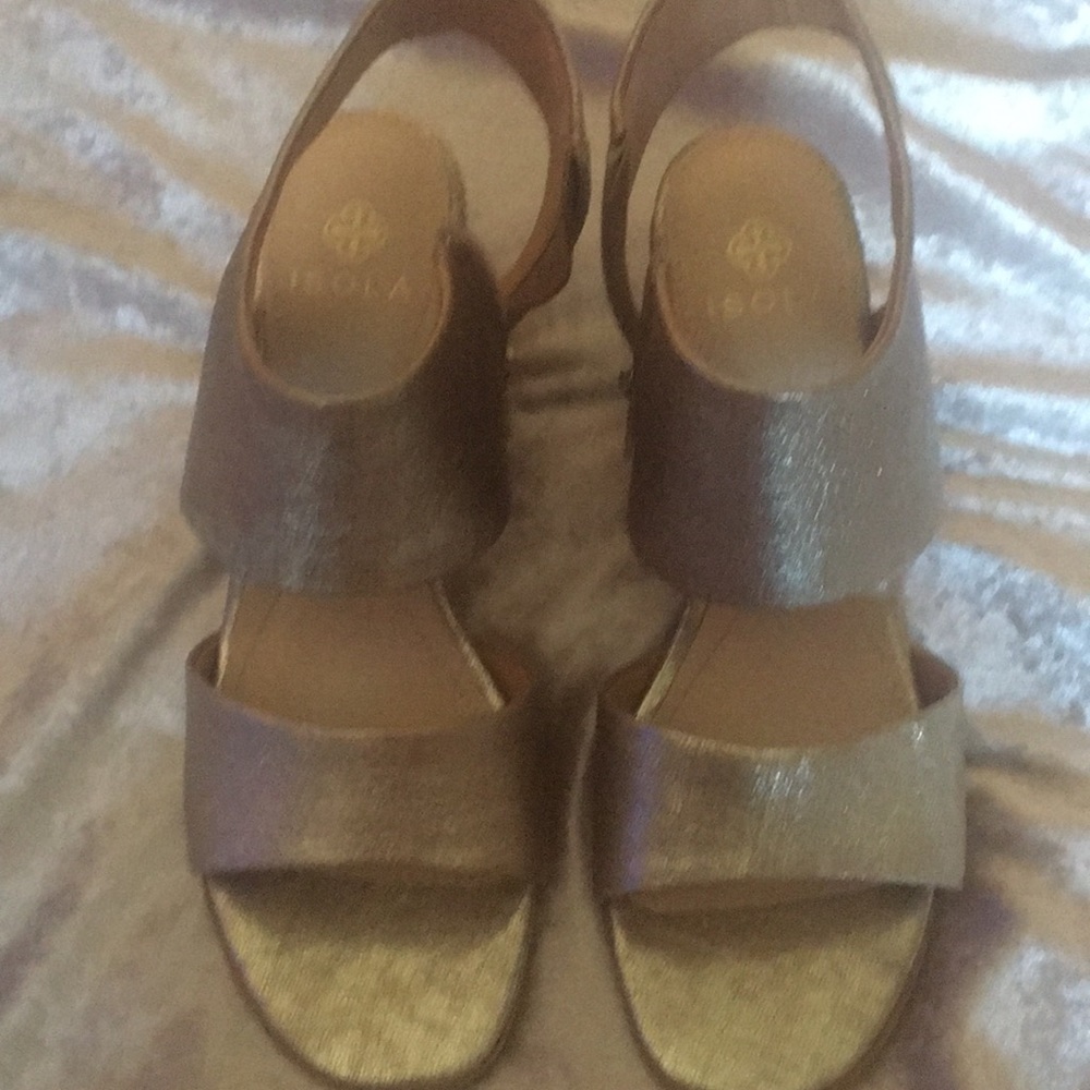 Gold tone sandals with chunky heel.